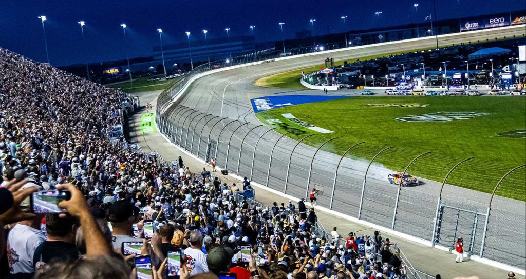 Chase Briscoe lays down a burnout on the frontstretch after winning at Chicagoland Speedway
