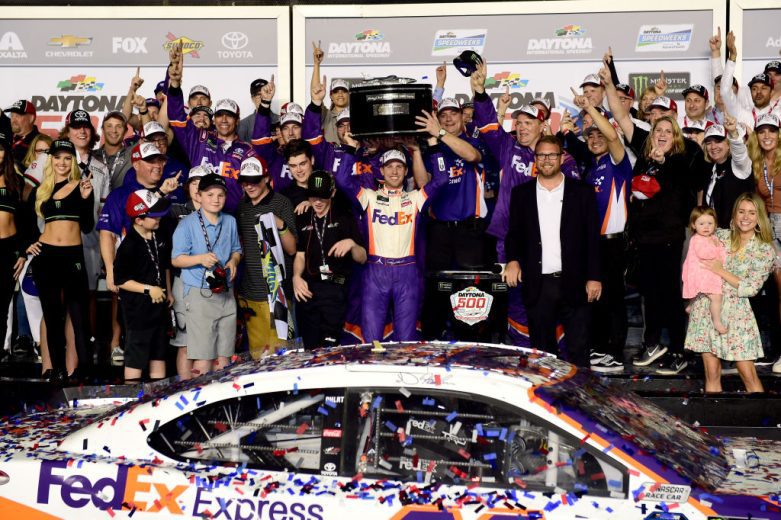 Denny Hamlin celebrates in Victory Lane.