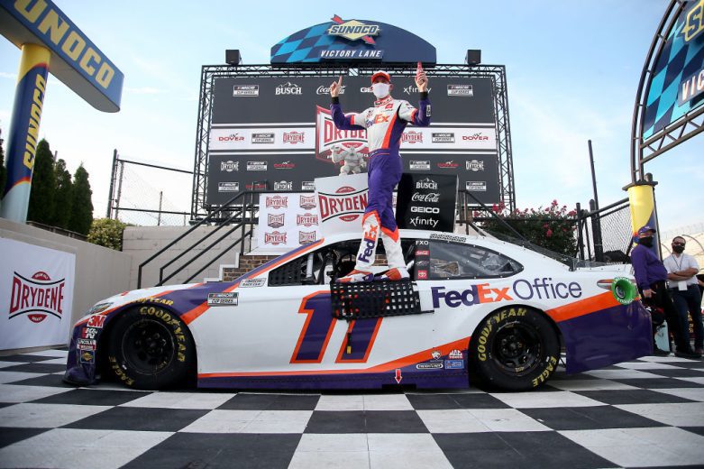 Denny Hamlin celebrates in Victory Lane.