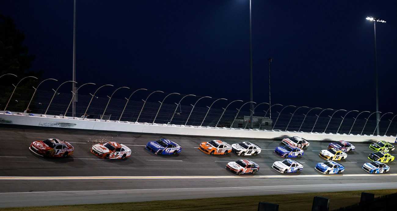 NASCAR O'Reilly Auto Parts Series cars race at EchoPark Speedway.