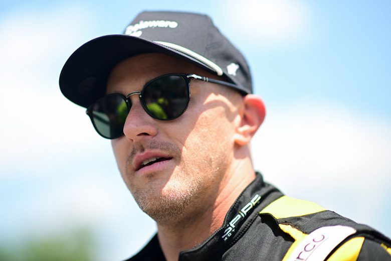Parker Kligerman looks on.