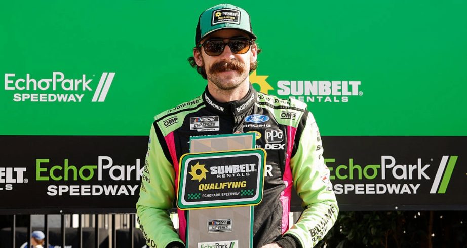 Ryan Blaney celebrates after winning the pole at EchoPark.