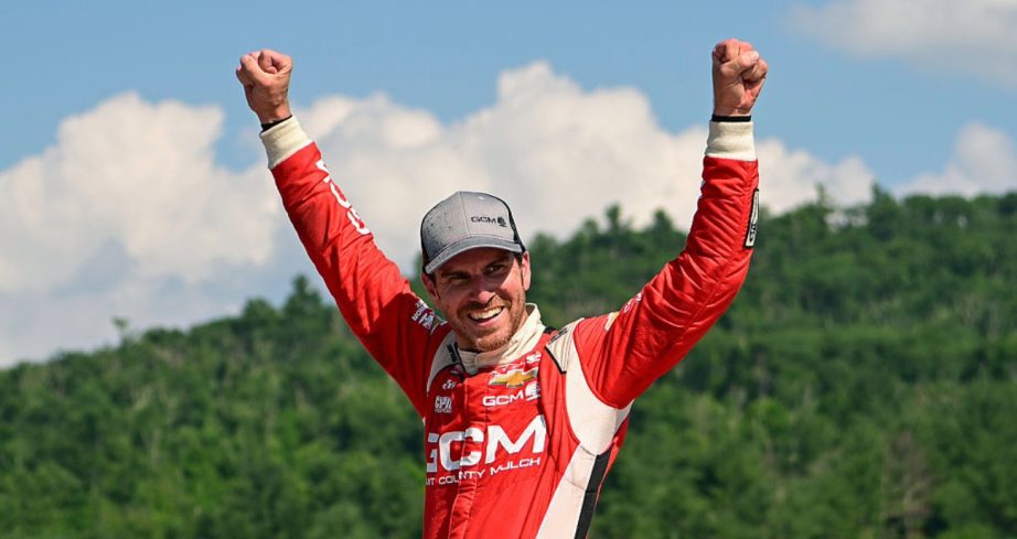 Grant Enfinger celebrates after winning at Lime Rock.