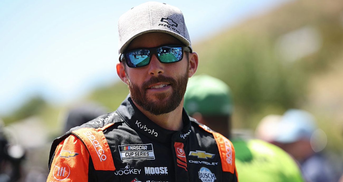 Ross Chastain looks on.