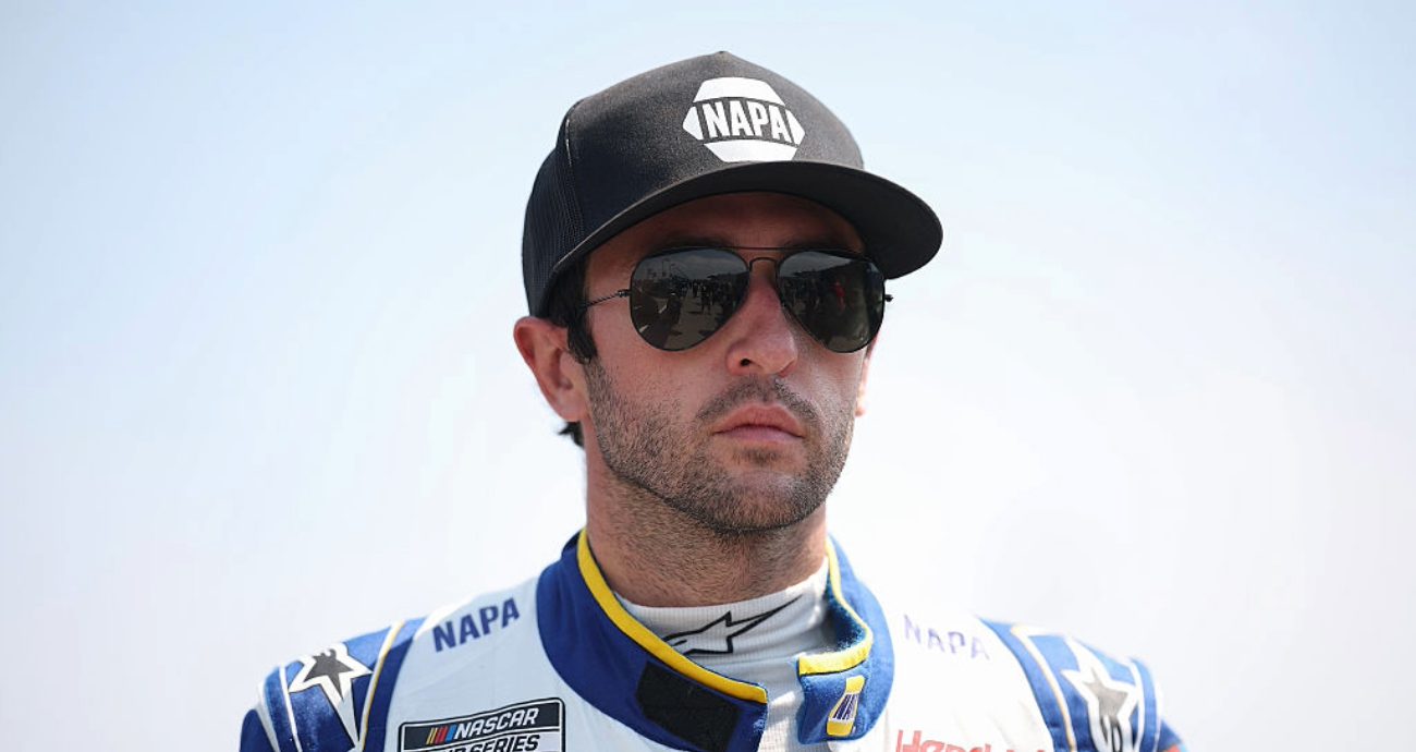 Chase Elliott looks on.