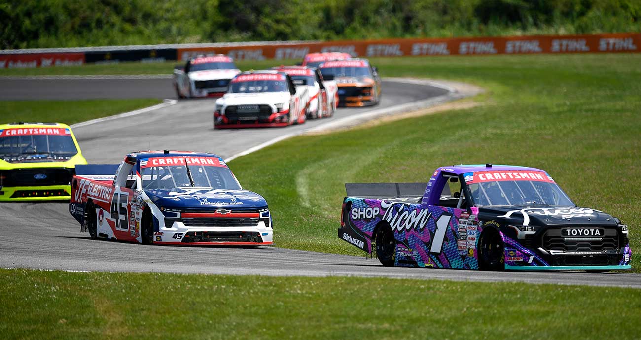 Thomas Annunziata's No. 1 Toyota is pressured by the No, 45 Chevy of Landen Lewis at Lime Rock Park.