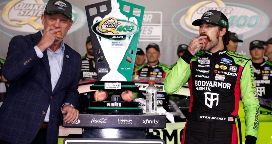 Ryan Blaney celebrates atop his car after winning at EchoPark Speedway Click to read SWEET AS A PEACH