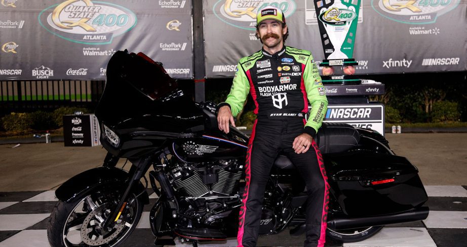 Ryan Blaney poses for a photo in Victory Lane at EchoPark Speedway.