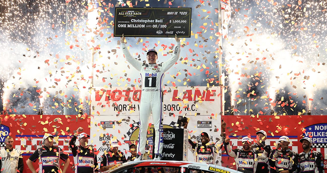 christopher bell celebrates after winning the all-star race