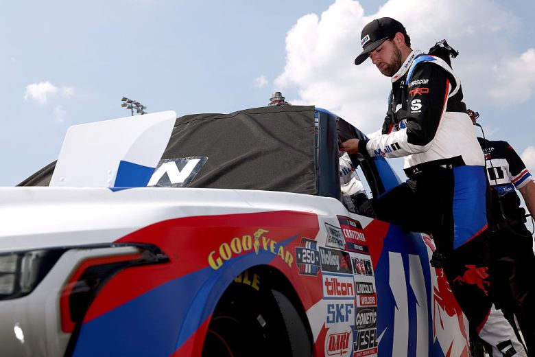 Kaden Honeycutt enters his truck.