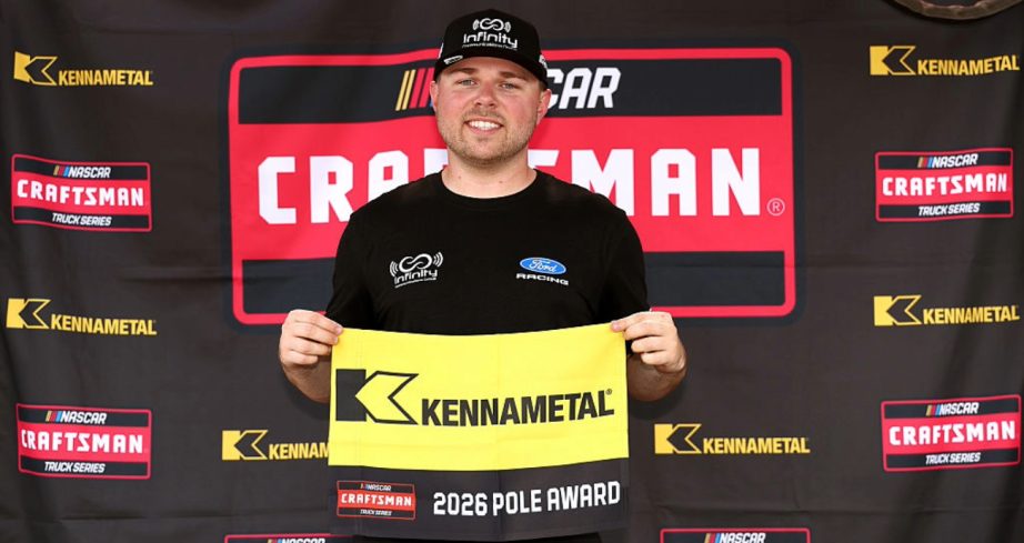 Layne Riggs celebrates after winning the pole at North Wilkesboro.