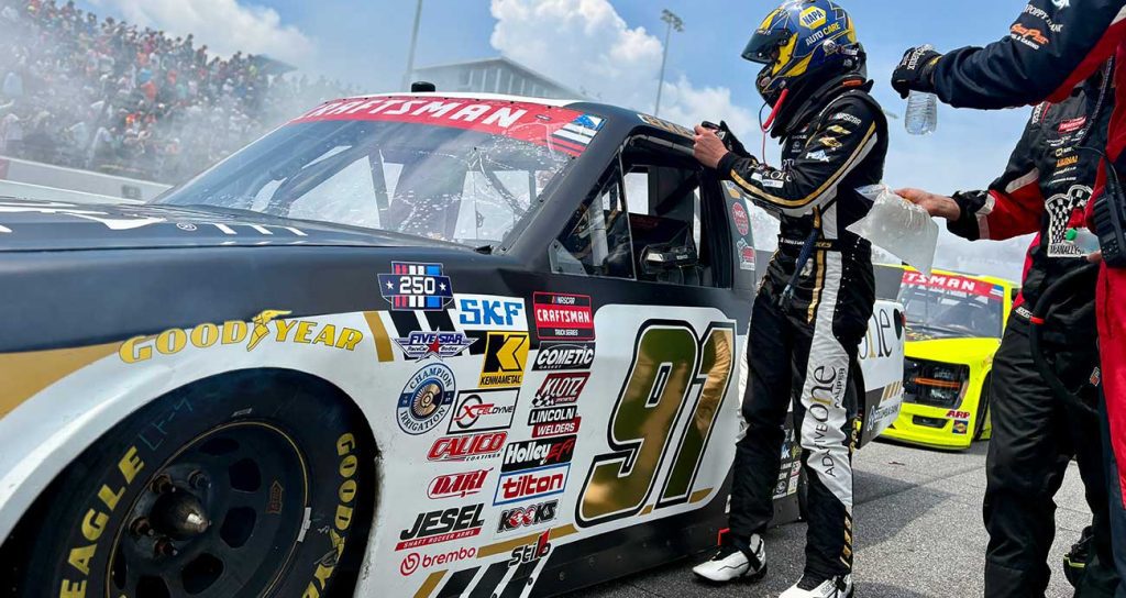 Christian Eckes exits his No. 91 Chevrolet on pit road at North Wilkesboro Speedway