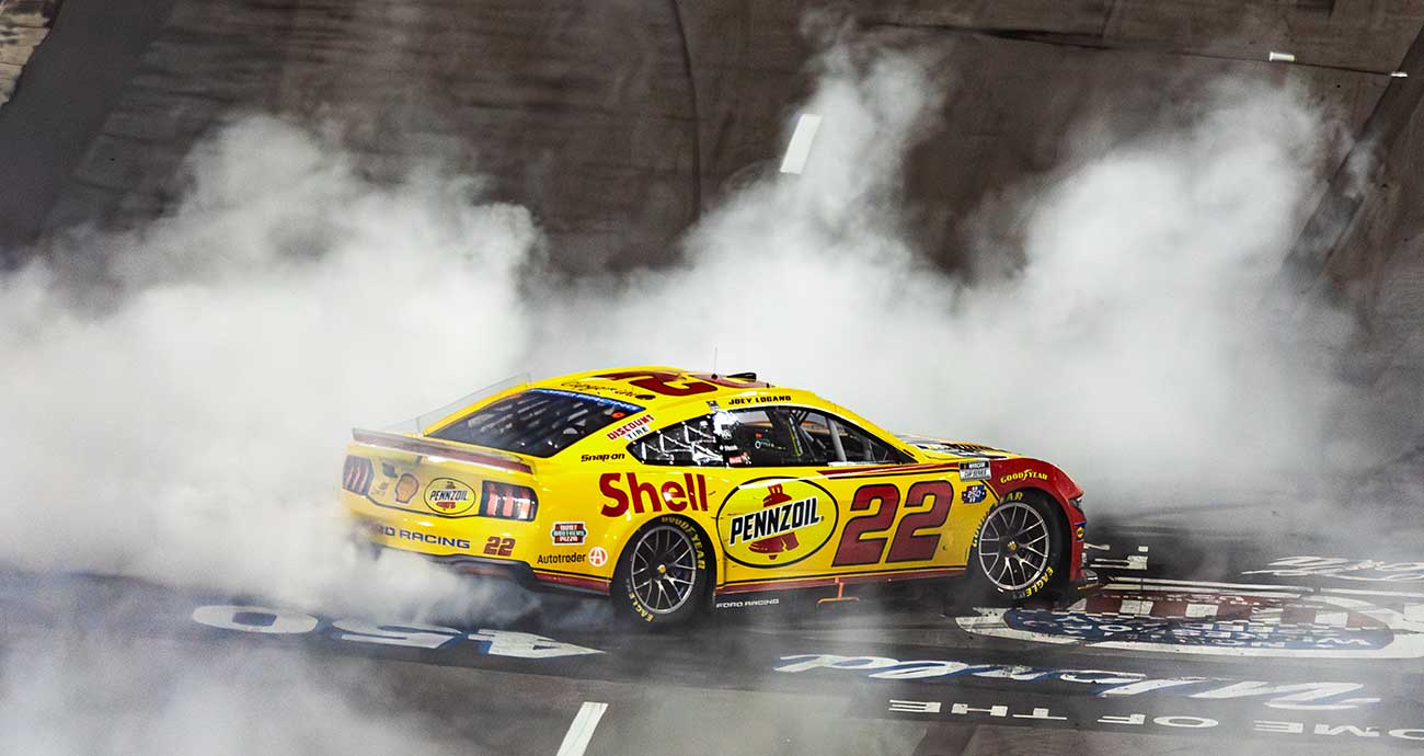 Joey Logano lays down a smoky burnout on the frontstretch at North Wilkesboro Speedway