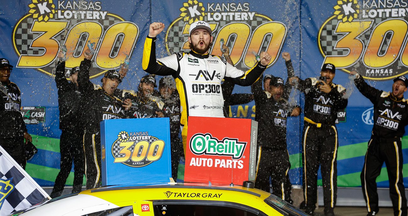 Taylor Gray celebrates in Victory Lane at Kansas Speedway.