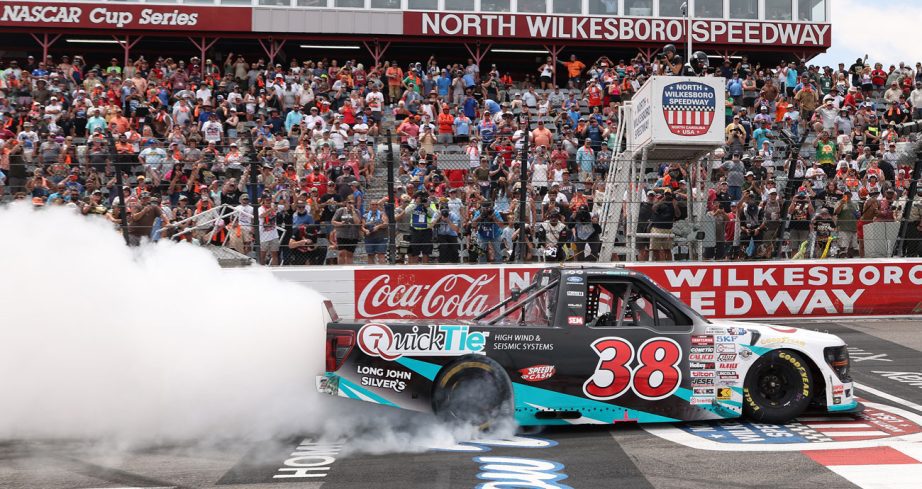 Chandler Smith does a celebratory burnout in the No. 38 Ford.