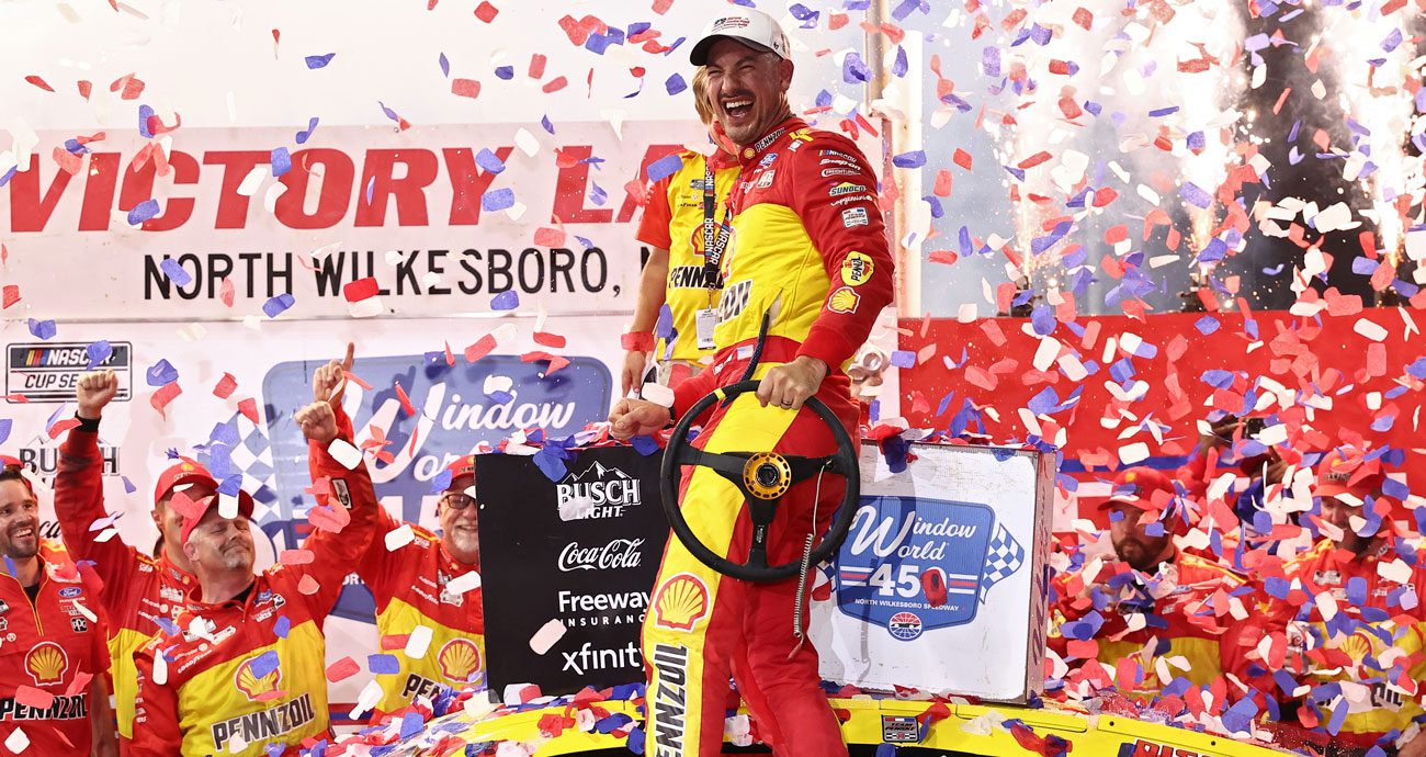Joey Logano celebrates.