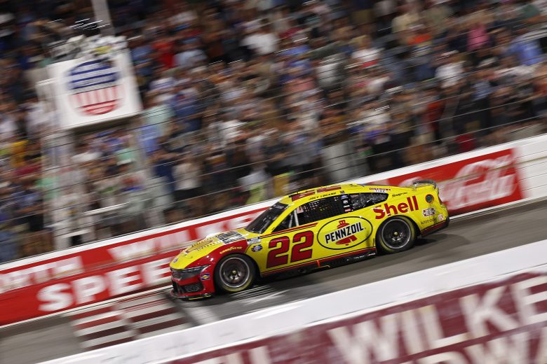 Joey Logano crosses the start/finish line at North Wilkesboro Speedway.