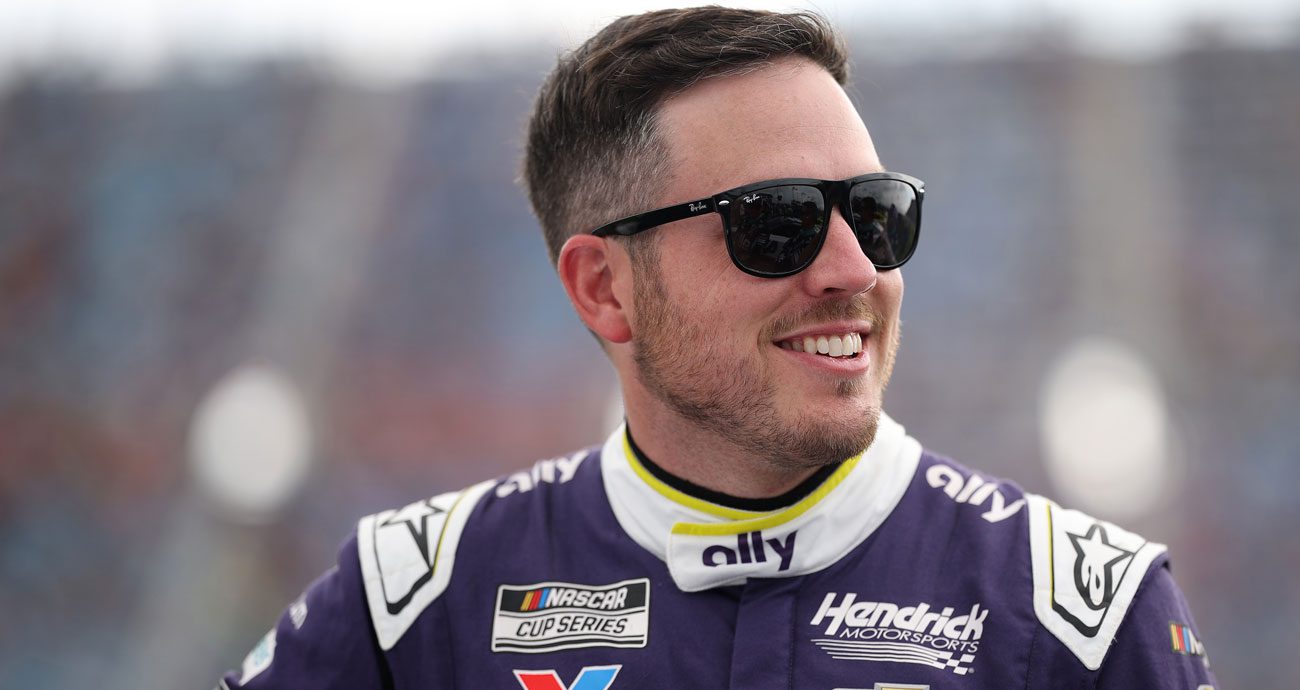 Alex Bowman looks on at a NASCAR Cup Series race.