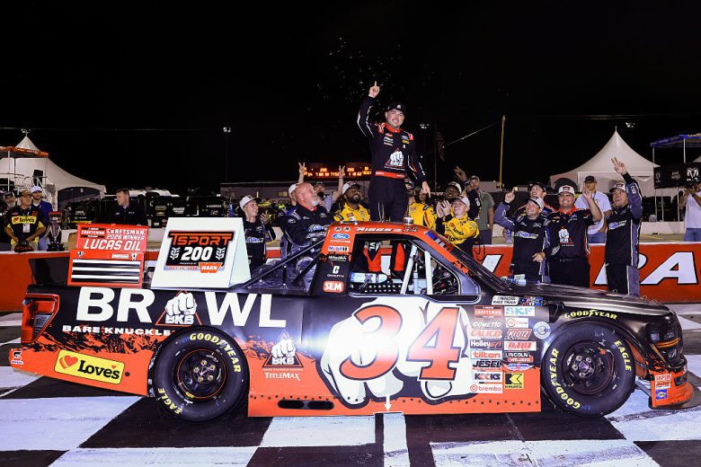 Layne Riggs celebrates in Victory Lane at IRP.