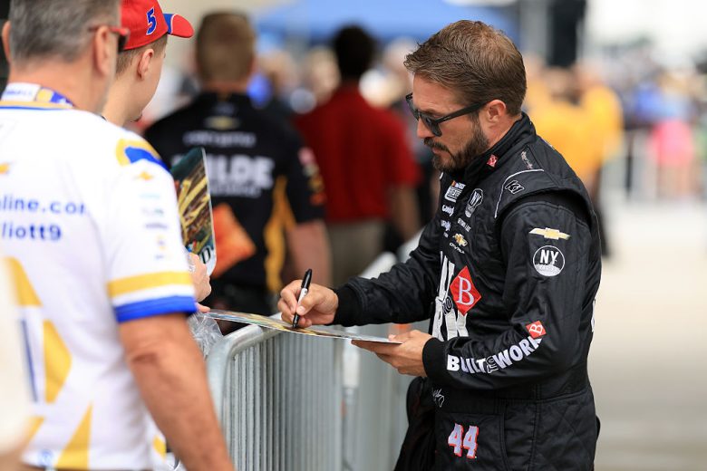JJ Yeley signs autographs for fans at Indianapolis.