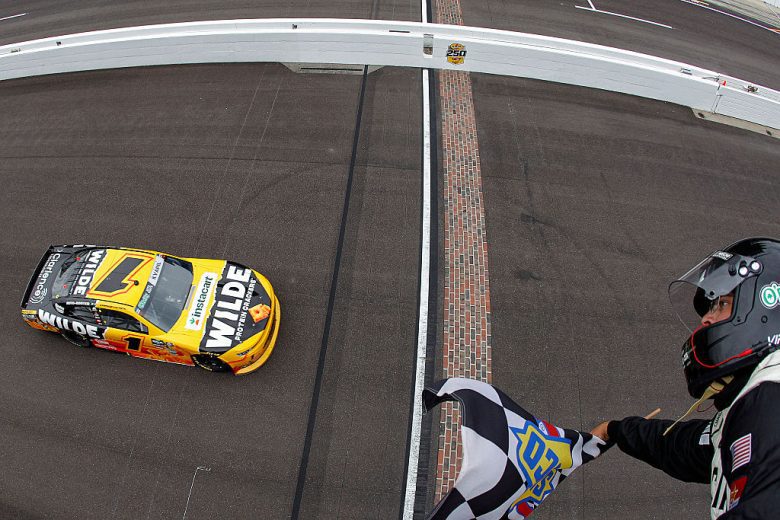 Carson Kvapil takes the checkered flag at Indianapolis.