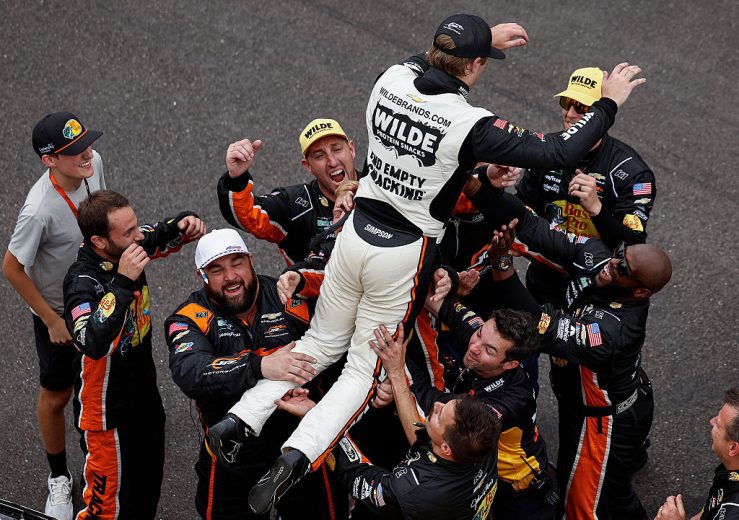 Carson Kvapil celebrates with his team at Indianapolis.