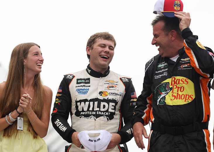 Carson Kvapil celebrates with his girlfriend and crew chief.