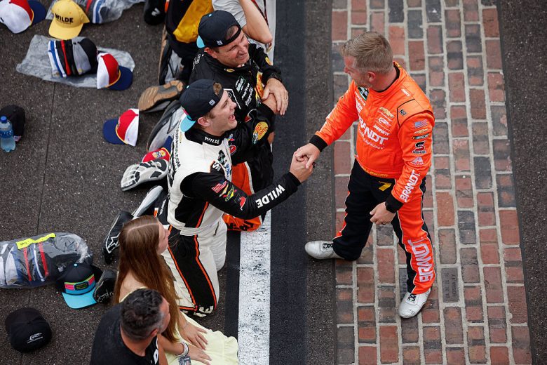 Justin Allgaier congratulates Carson Kvapil.