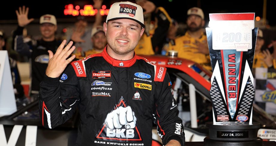 Layne Riggs celebrates in Victory Lane at IRP.