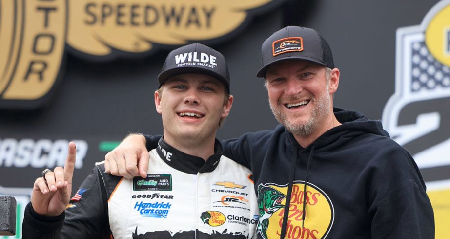 Carson Kvapil and Dale Earnhardt Jr. celebrate in Victory Lane at Indianapolis.