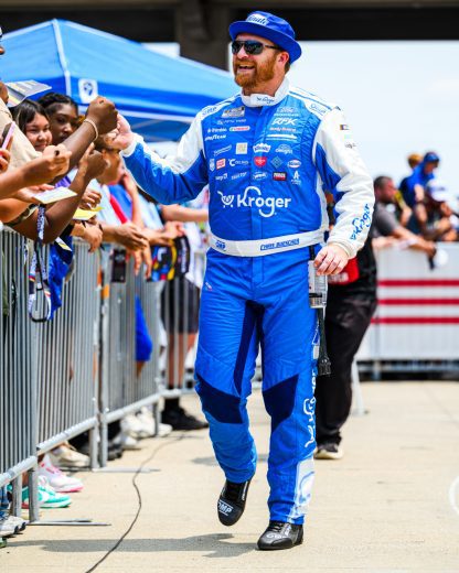 Chris Buescher greets fans.