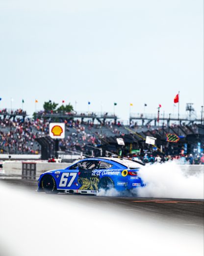 Corey Heim does a celebratory burnout.