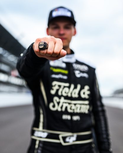 Corey Heim shows off the Brickyard 400 ring.