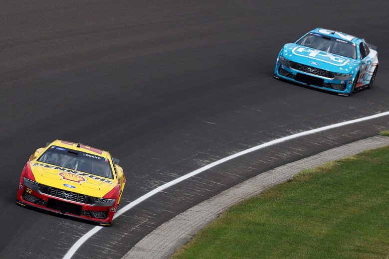 Joey Logano and Josh Berry race at Indianapolis Motor Speedway.