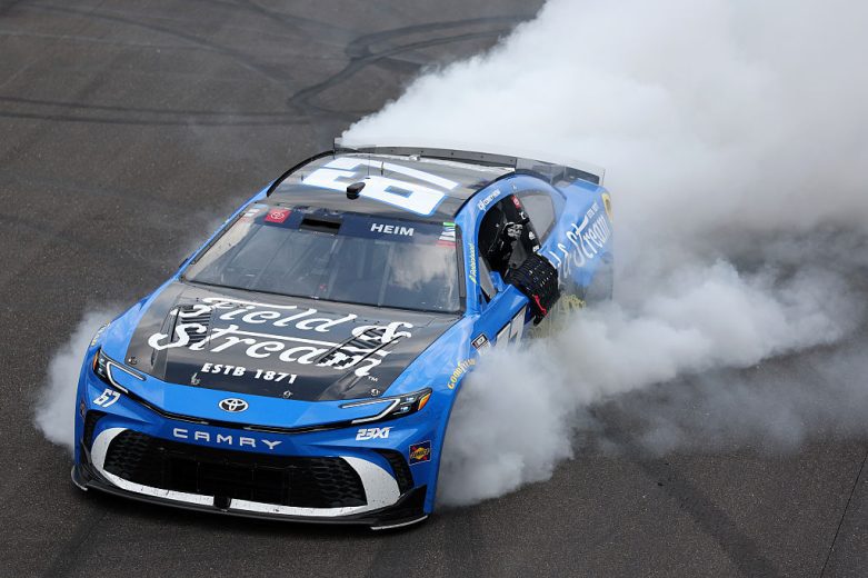 Corey Heim does a celebratory burnout in the No. 67 Toyota.