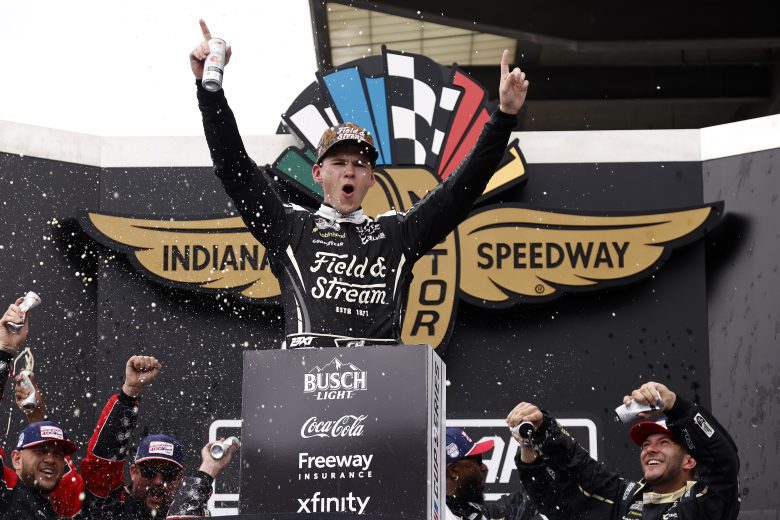Corey Heim celebrates in Victory Lane.