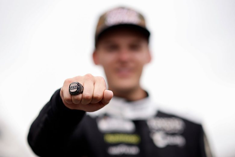 Corey Heim poses with the Brickyard 400 ring.
