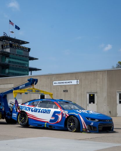 The No. 5 Hendrick Motorsports Chevrolet gets towed to the garage.