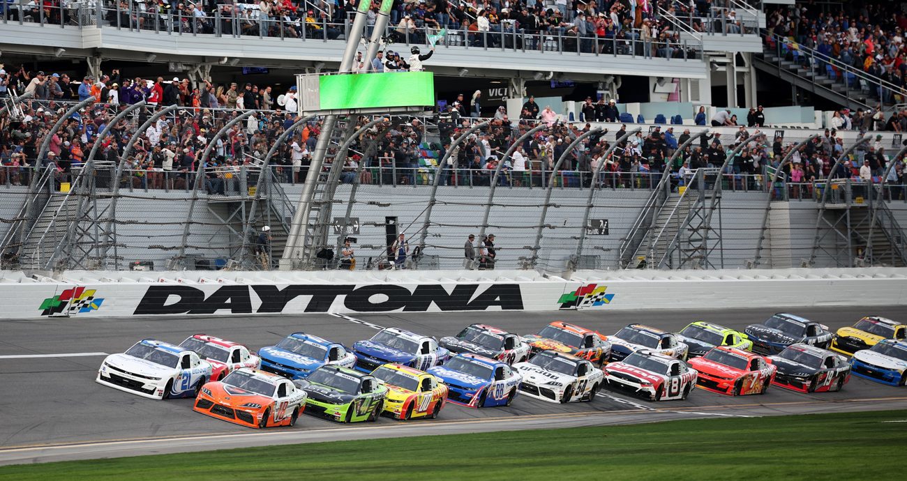 William Sawalich, driver of the No. 18 Soundgear Toyota, and Austin Hill, driver of the No. 21 Bennett Transportation Chevrolet, lead the field during the NASCAR O'Reilly Auto Parts Series United Rentals 300 at Daytona International Speedway on Feb. 14, 2026 in Daytona Beach, Florida.