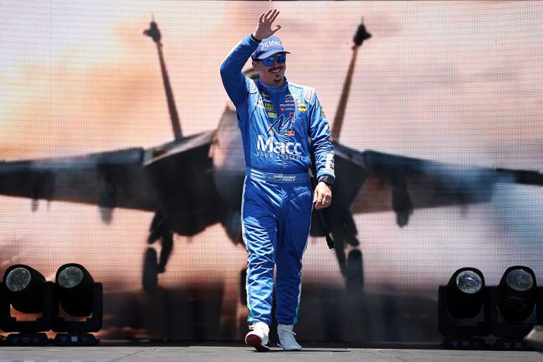 Brennan Poole waves to the crowd.