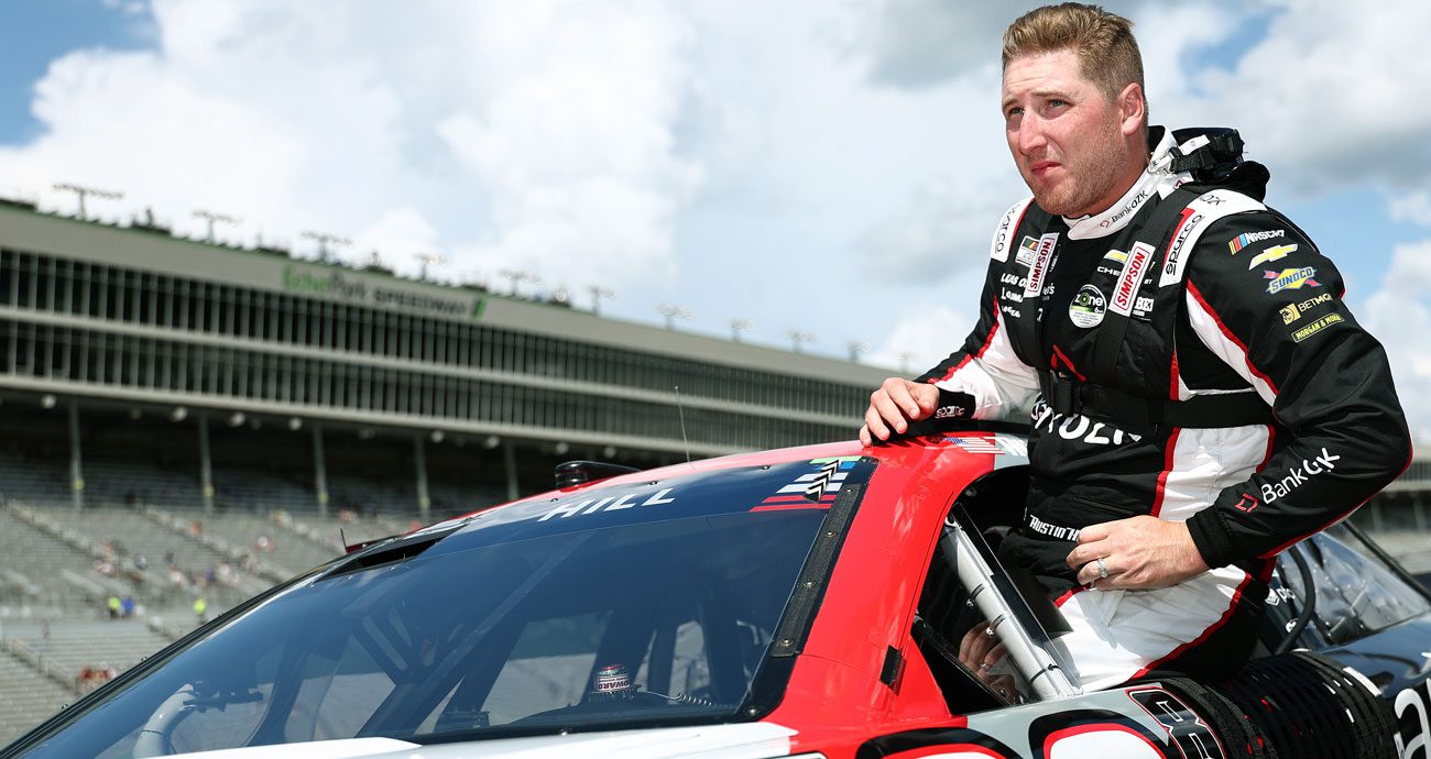 Austin Hill climbs in the No. 33 Richard Childress Racing Chevrolet in the NASCAR Cup Series.