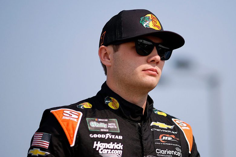 Carson Kvapil looks on.