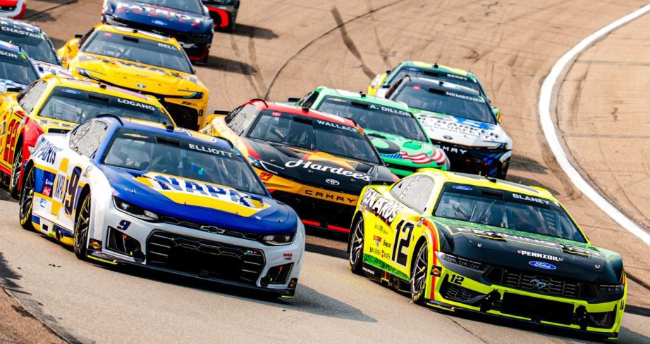 View of Cup Series cars racing at Iowa Speedway.