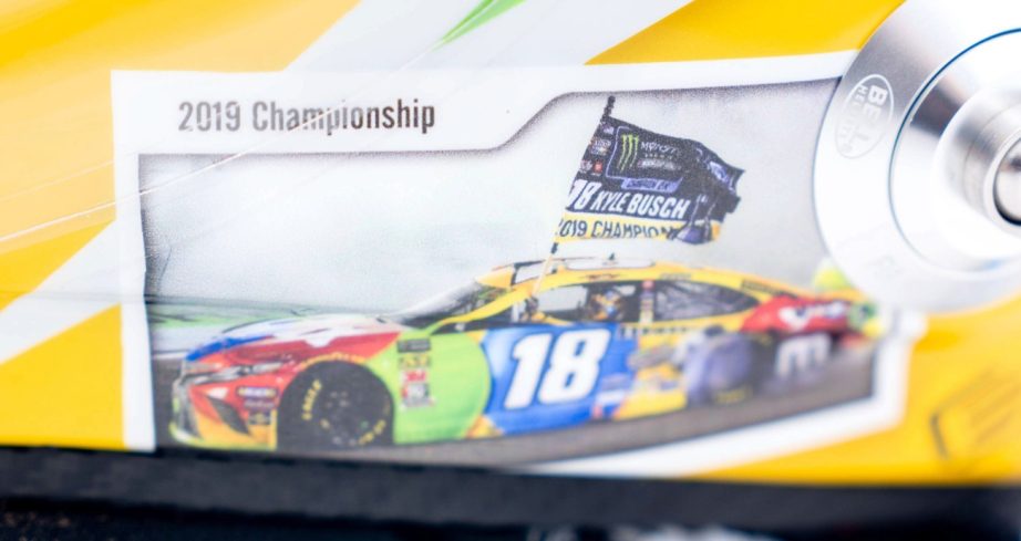 Close up view of a photo from Kyle Busch winning the 2019 Championship.