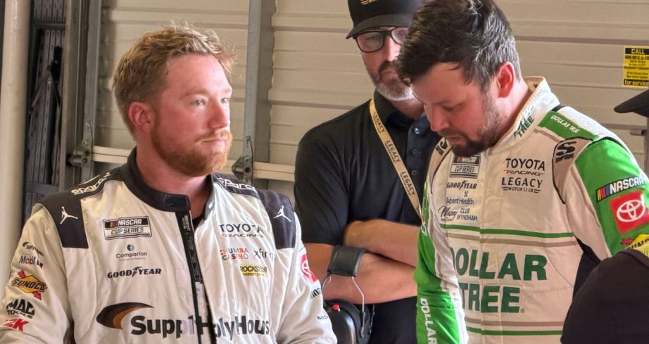 Tyler Reddick and Erik Jones talk after a NASCAR Cup Series crash at Iowa.