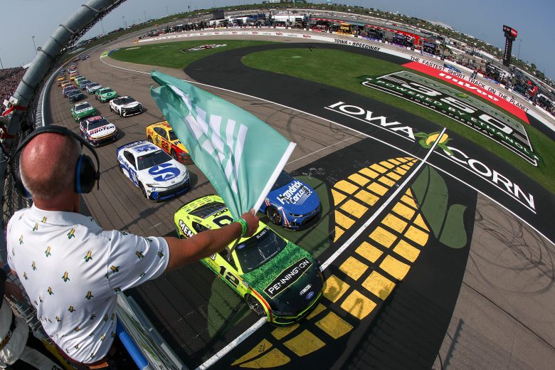 Cup Series cars drive on track at Iowa.