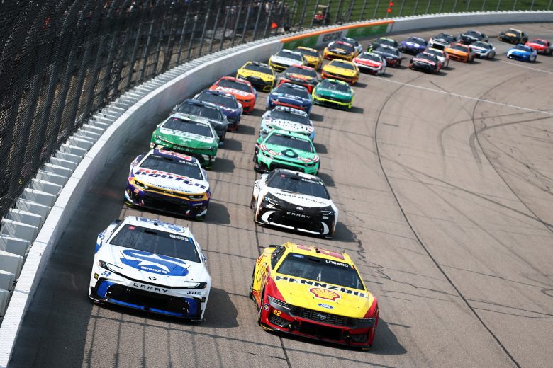 Cup Series cars drive on track at Iowa.