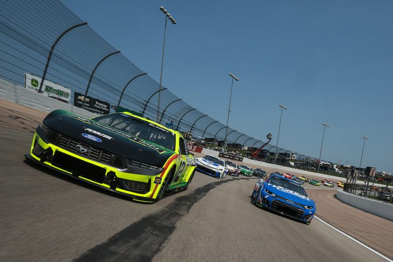 Cup Series cars drive on track at Iowa.