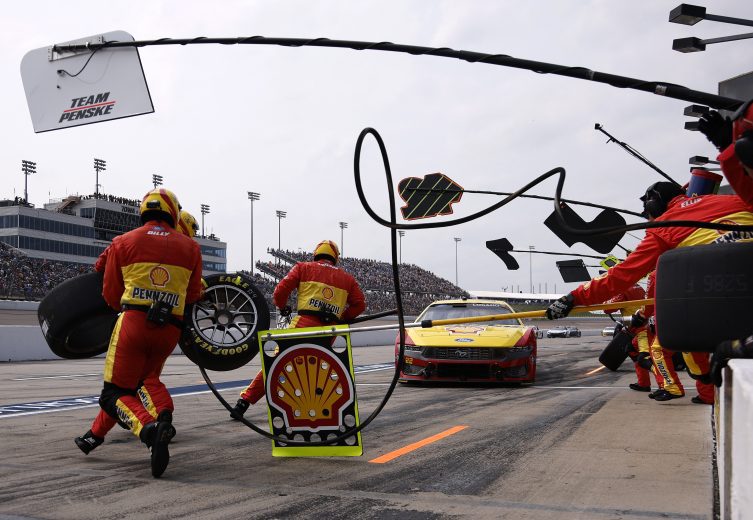 Joey Logano comes in for a pit stop at Iowa.