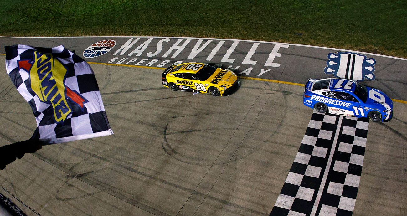 Christopher Bell finishes second to Denny Hamlin at Nashville as the checkered flag waves.